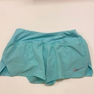 Teal nike running shorts